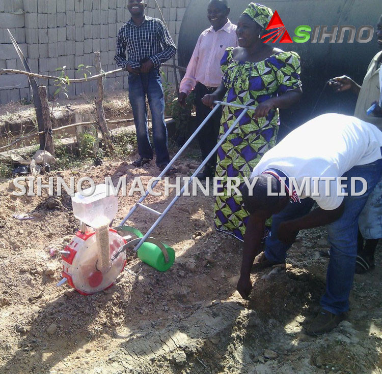 Home Hand Push Manual Corn/Maize/Vegetable/Fertilizer Seeder/Planter